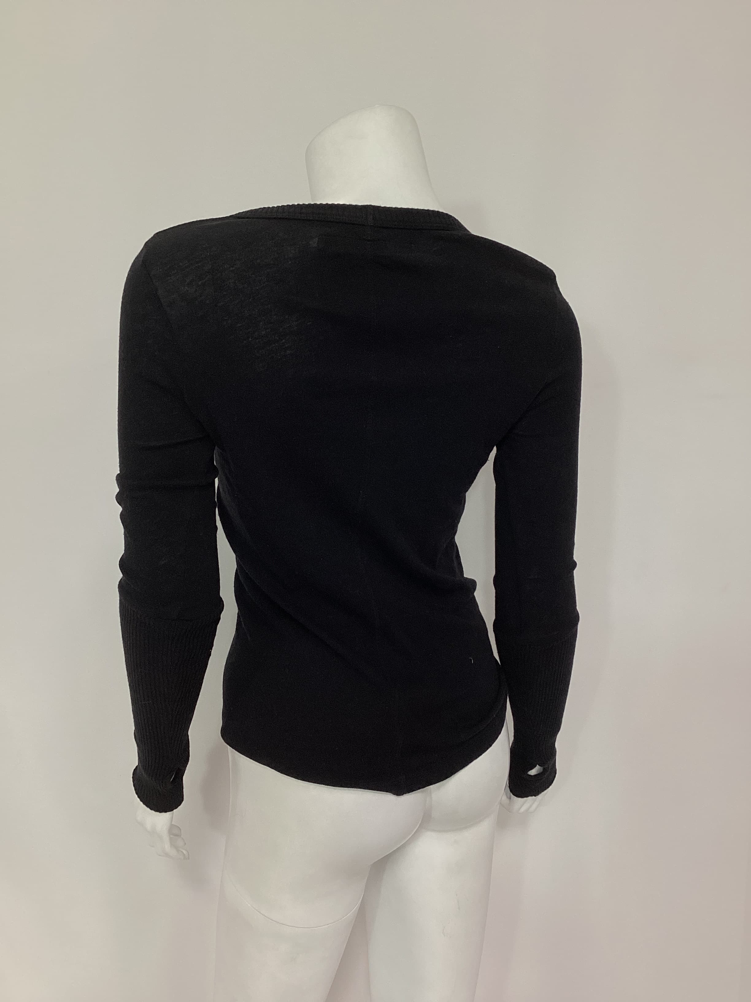 First Layered Cuffed V Top In Black - Image 2