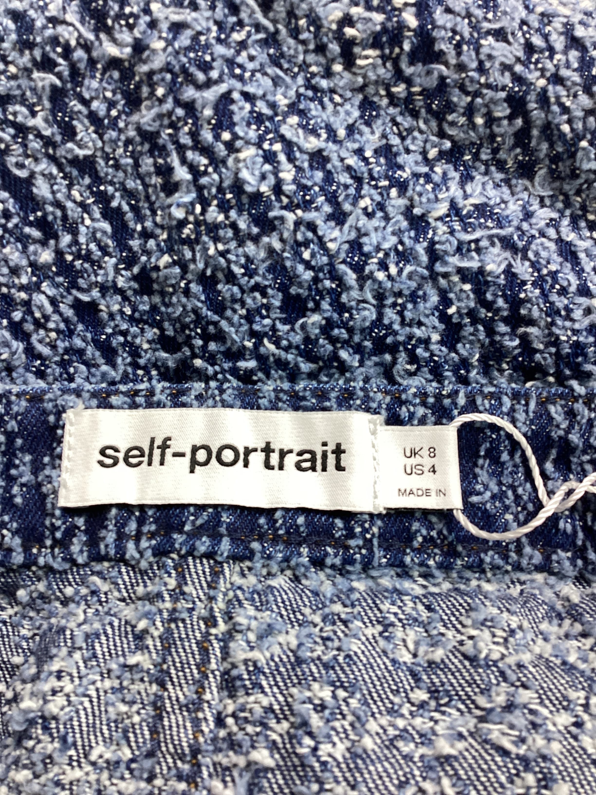 Textured Denim Mini Skirt In Blue - Image 4
