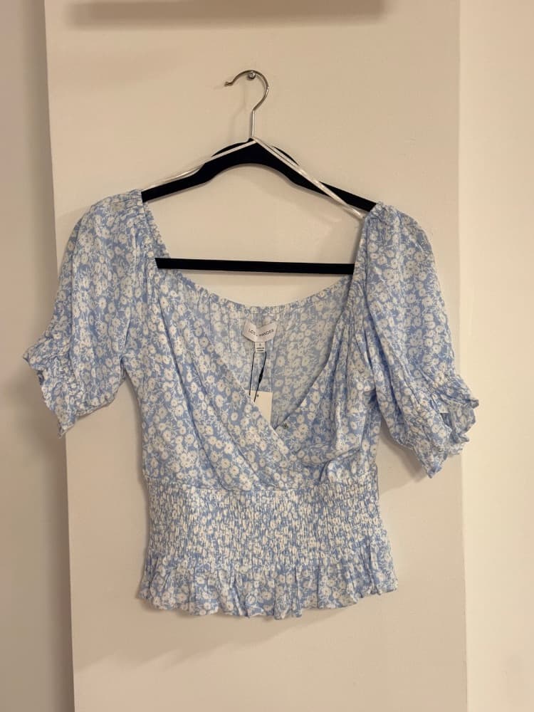 Lost + Wander Blue Floral Smocked Peplum Top - Image 1