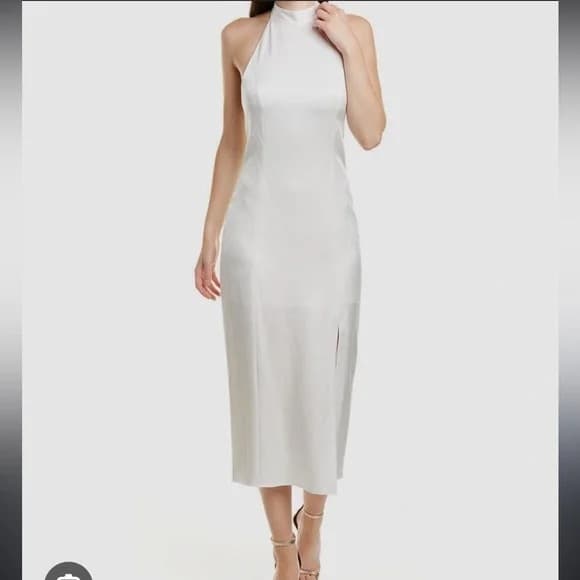 Alice + Olivia "Regina" satin halter dress featuring an open back and front slit. - Image 1