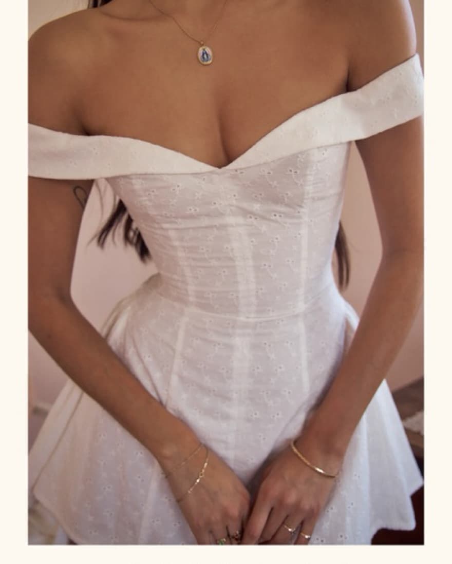 Mirror Palais Lady in White Eyelet Dress - Image 5