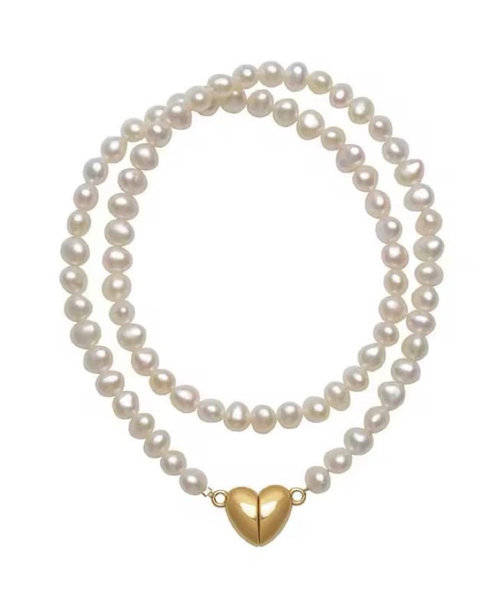 Elegant Pearl Necklace with Heart Pendant - Image 1