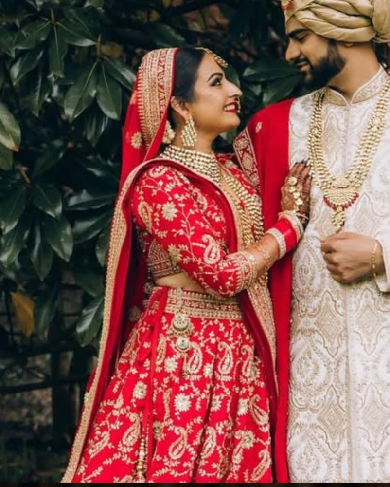 Exquisite Red and Gold Bridal Lehenga - Image 1