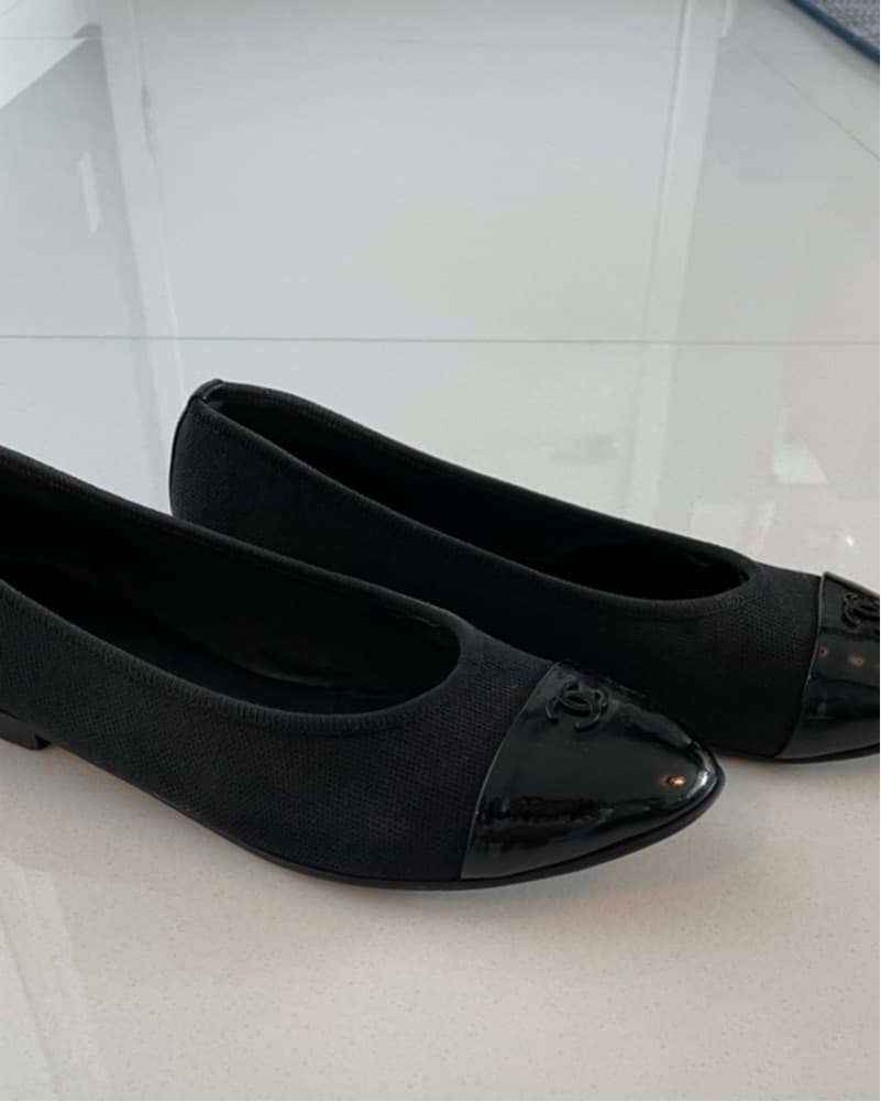 Chanel Sleek Black Flats - Image 1