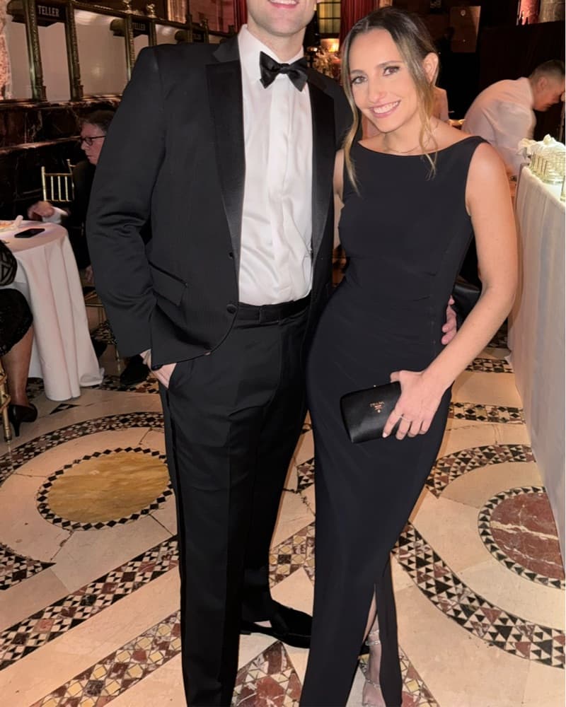 Elegant Black Gown with Bow Accent - Image 2