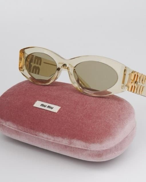 Miu Miu Transparent Oval Sunglasses - Image 1