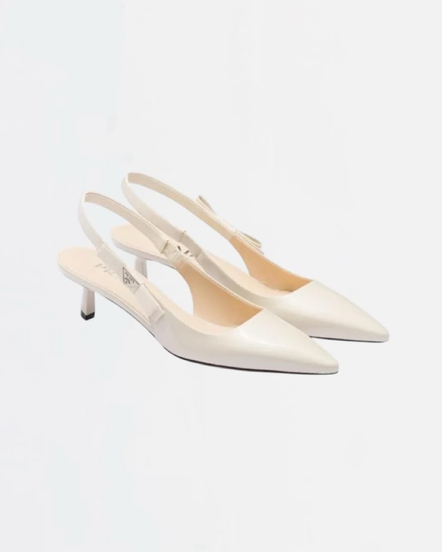 $1,220 Prada Ivory Bow Slingback Pumps - Image 1