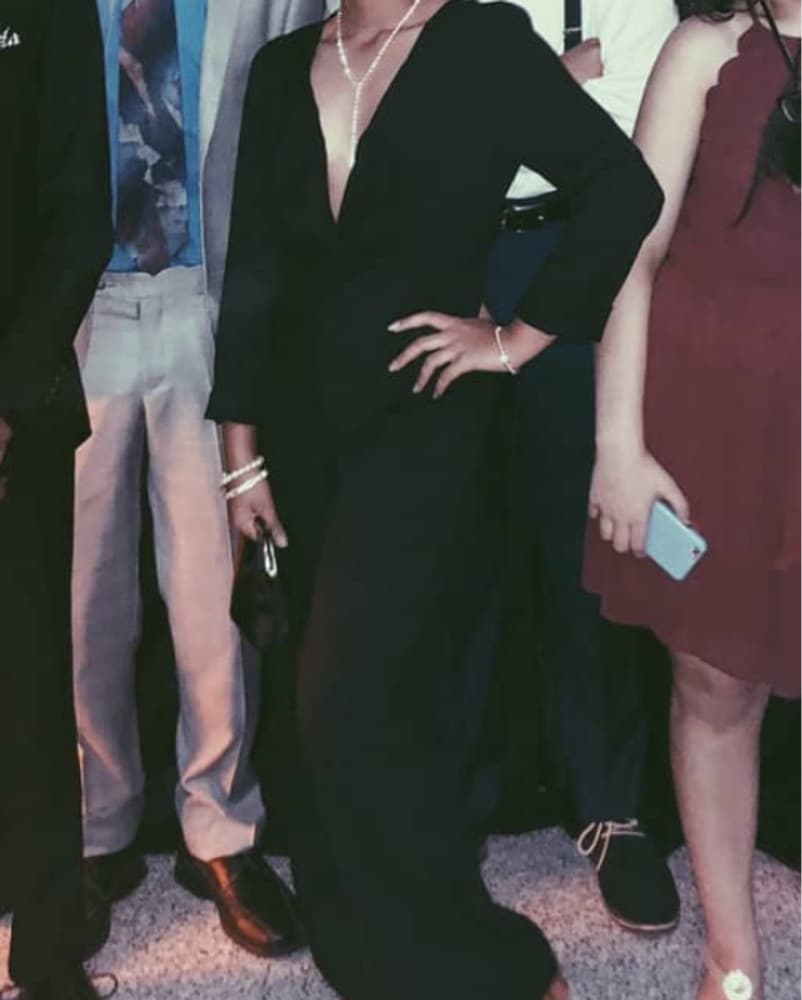 Elegant Black Deep-Neck Jumpsuit - Image 1