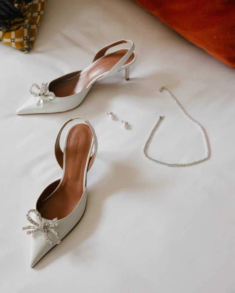 Amina Muaddi White Heels - Image 1