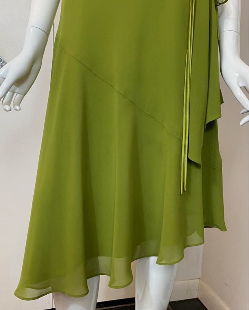 Vibrant Green Wrap Dress with Floral Accent - Image 3