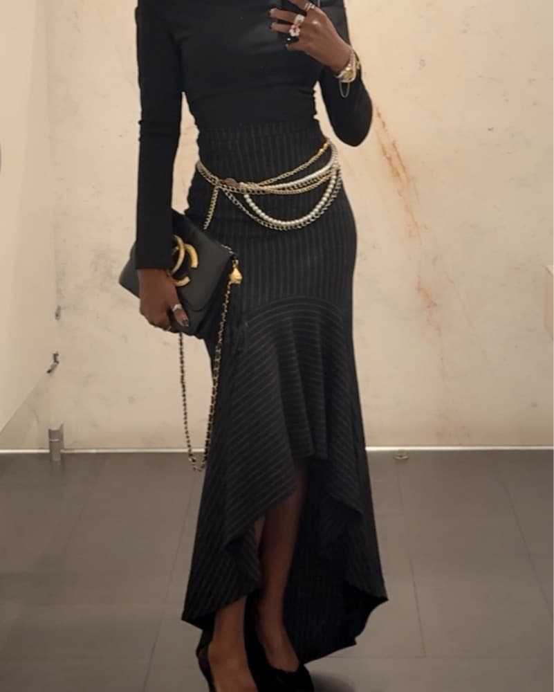 Elegant Black Maxi Dress with Dramatic Chains - Image 1