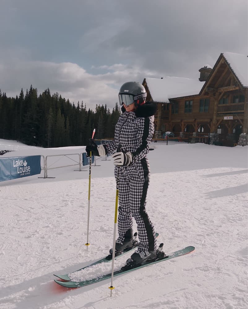 Black And White Ski Suit With Fur Trim - Image 2