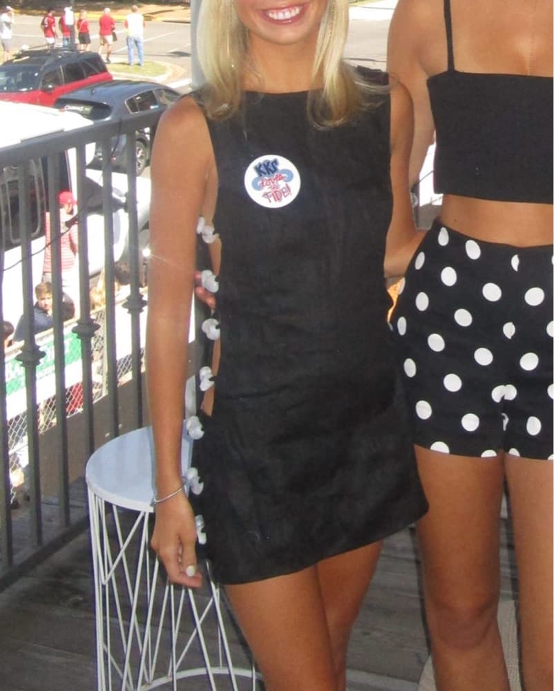 Chic Black Cocktail Dress with Floral Accents - Image 3