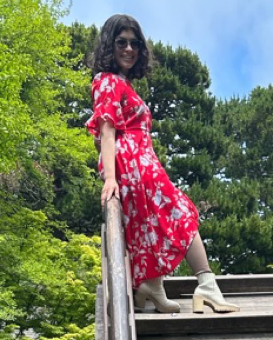 Red Flowy Floral Romper with Skirt - Image 3