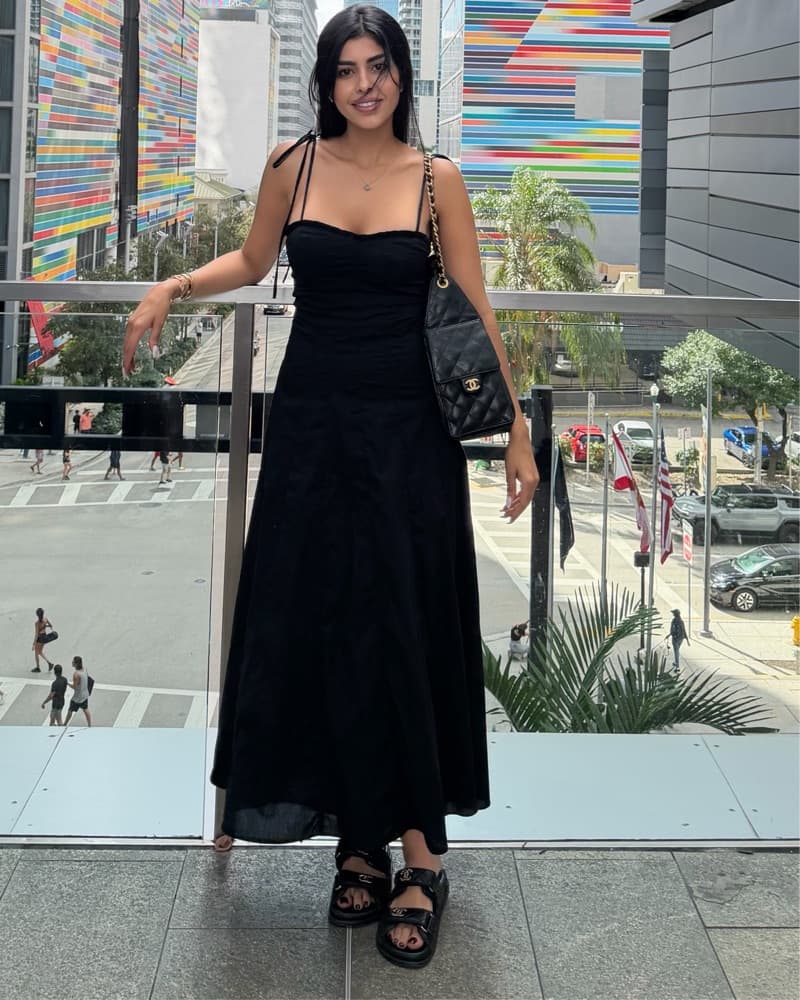 Chic Black Maxi Dress with Statement Accessories - Image 2