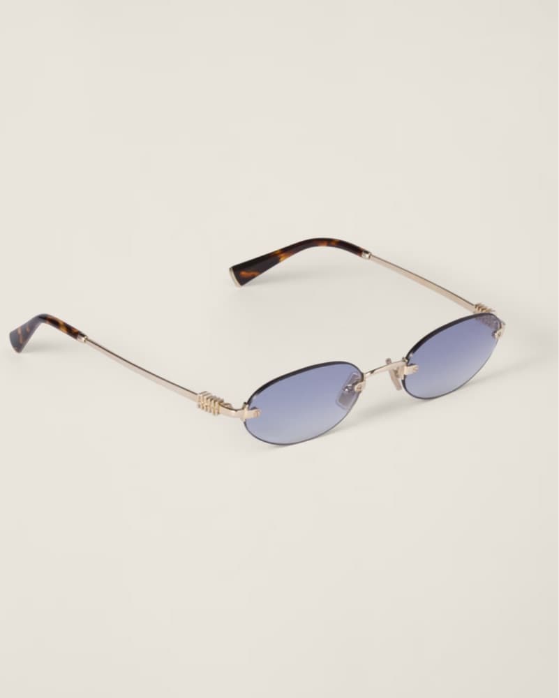 Miu Miu Logo Oval Sunglasses - Image 1