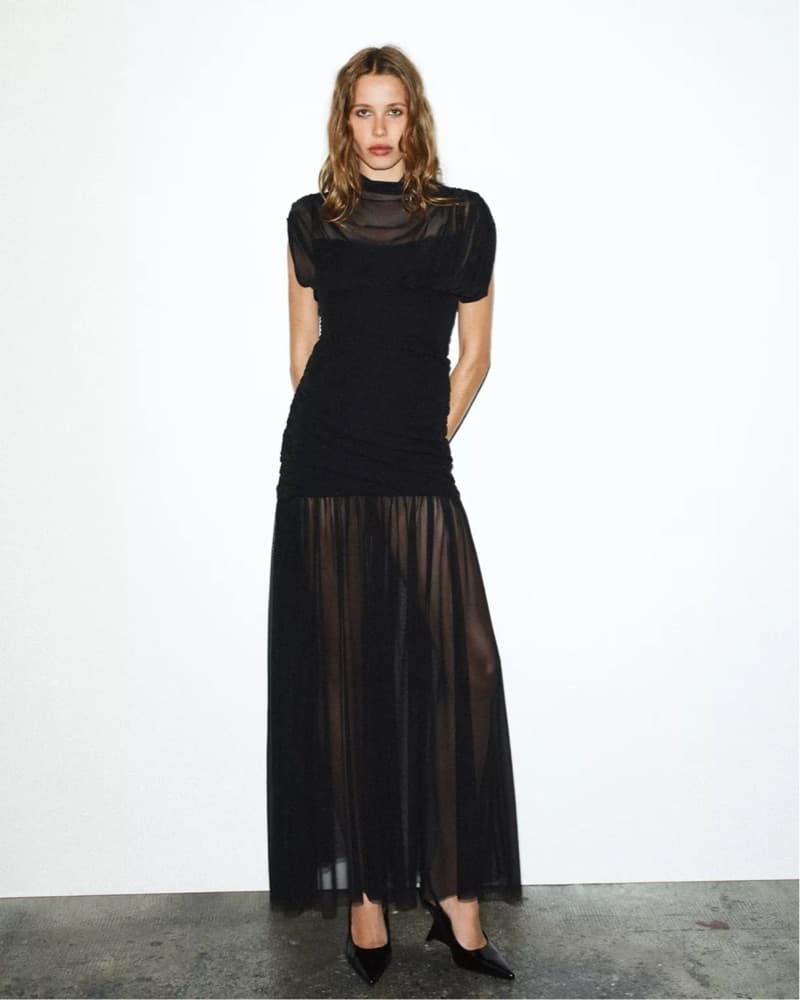 Sophisticated Black Gown with Sheer Details - Image 1
