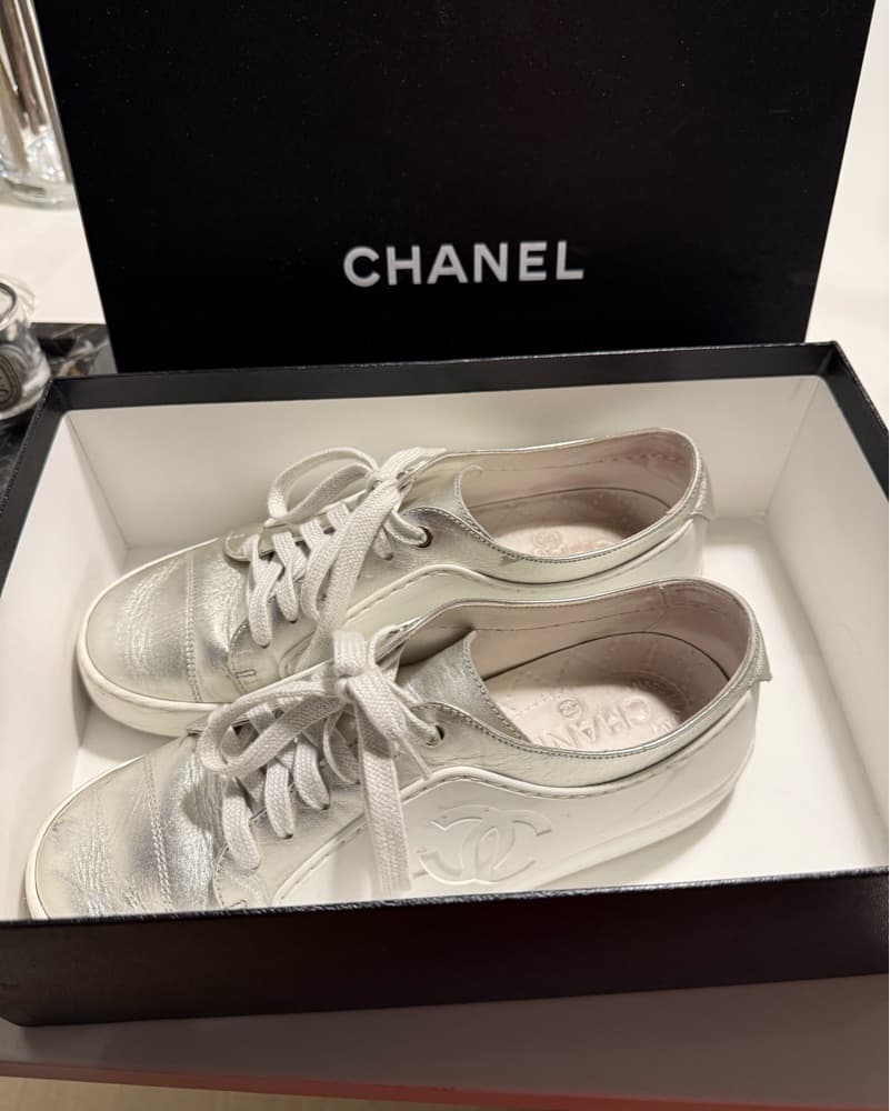 Chanel Metallic Silver Sneakers - Image 1