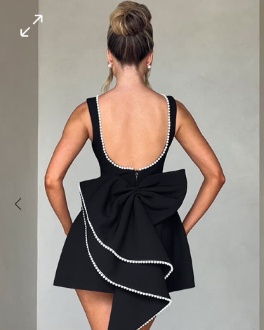 Sleek and Sophisticated Black Cocktail Dress - Image 3