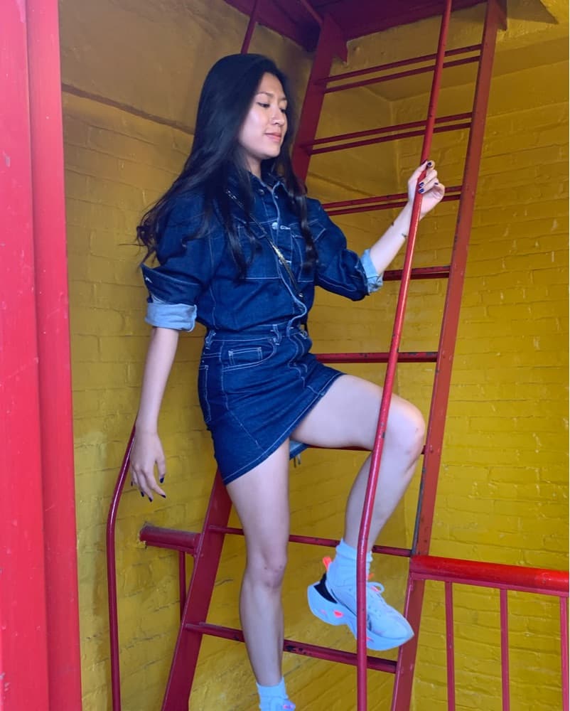 Stylish Denim Jumpsuit with Metallic Accent - Image 1
