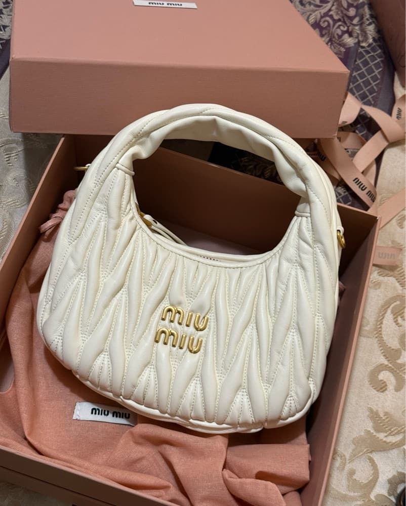 Miu Miu Quilted Leather Hobo Bag - Image 1