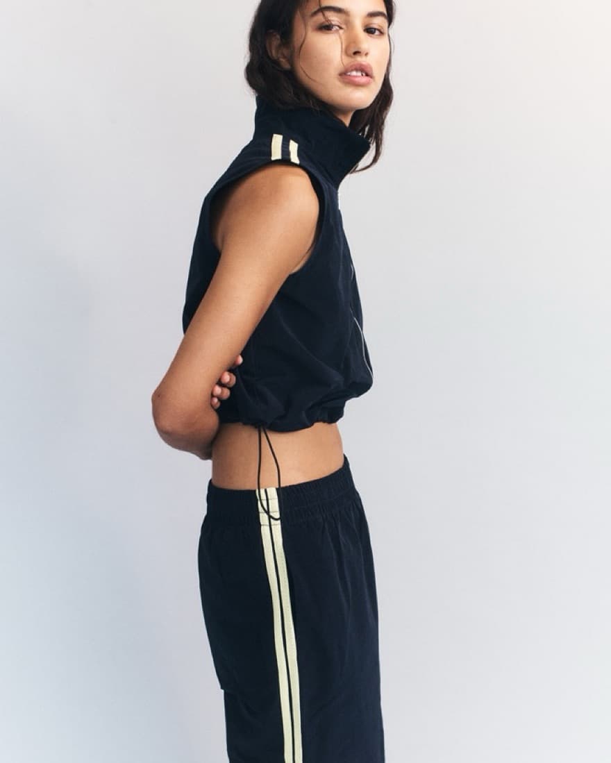 Sporty Chic Black Zip-up Top - Image 1