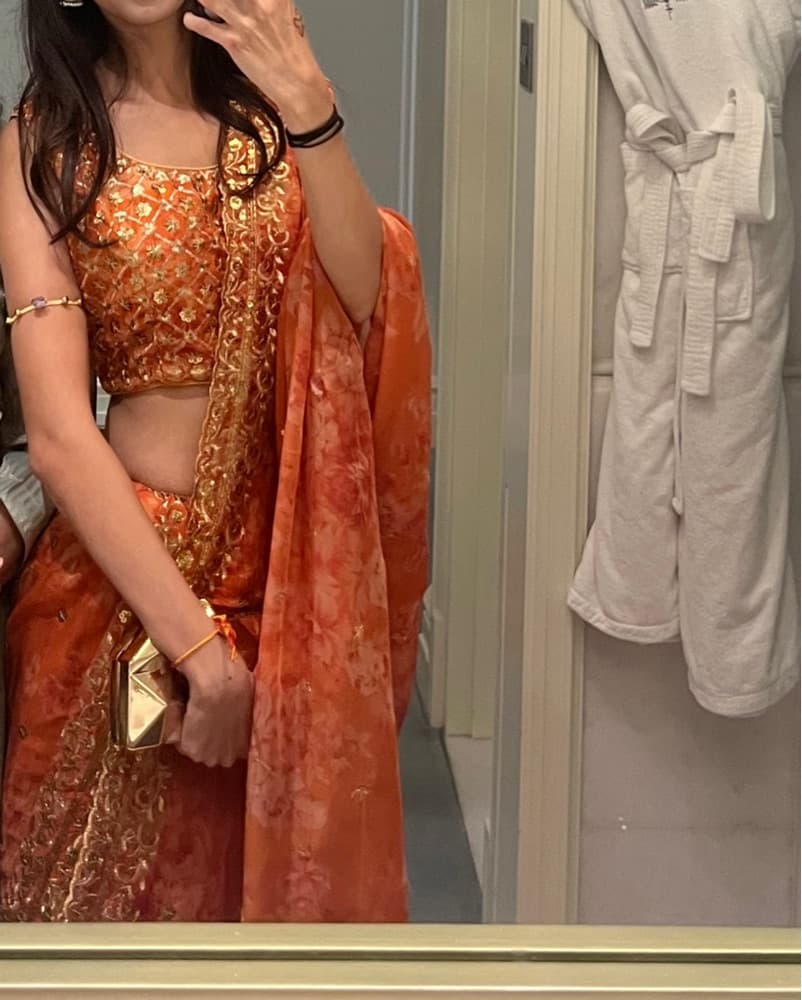 Vibrant Orange Embroidered Lehenga with Delicate Details - Image 3