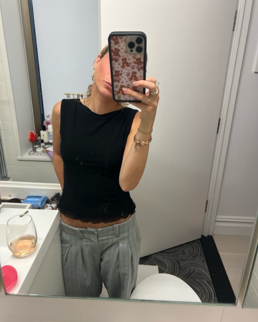Black Tank With Ruffle Bottom - Image 1