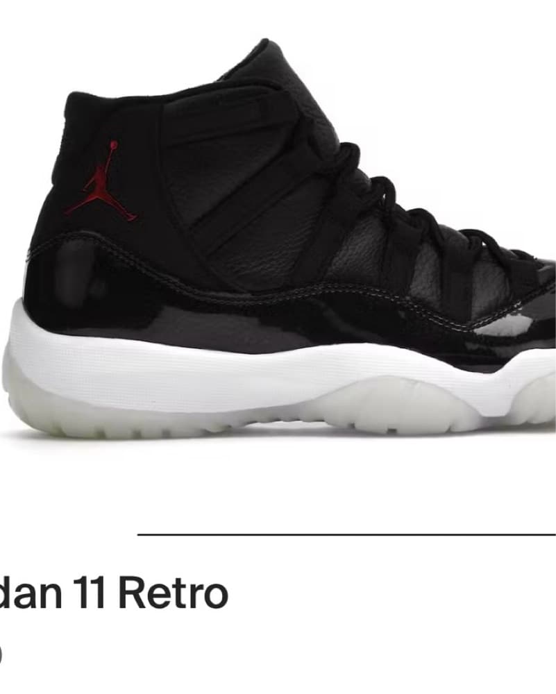 Sleek Black Jordan 11 Retro Sneakers - Image 1