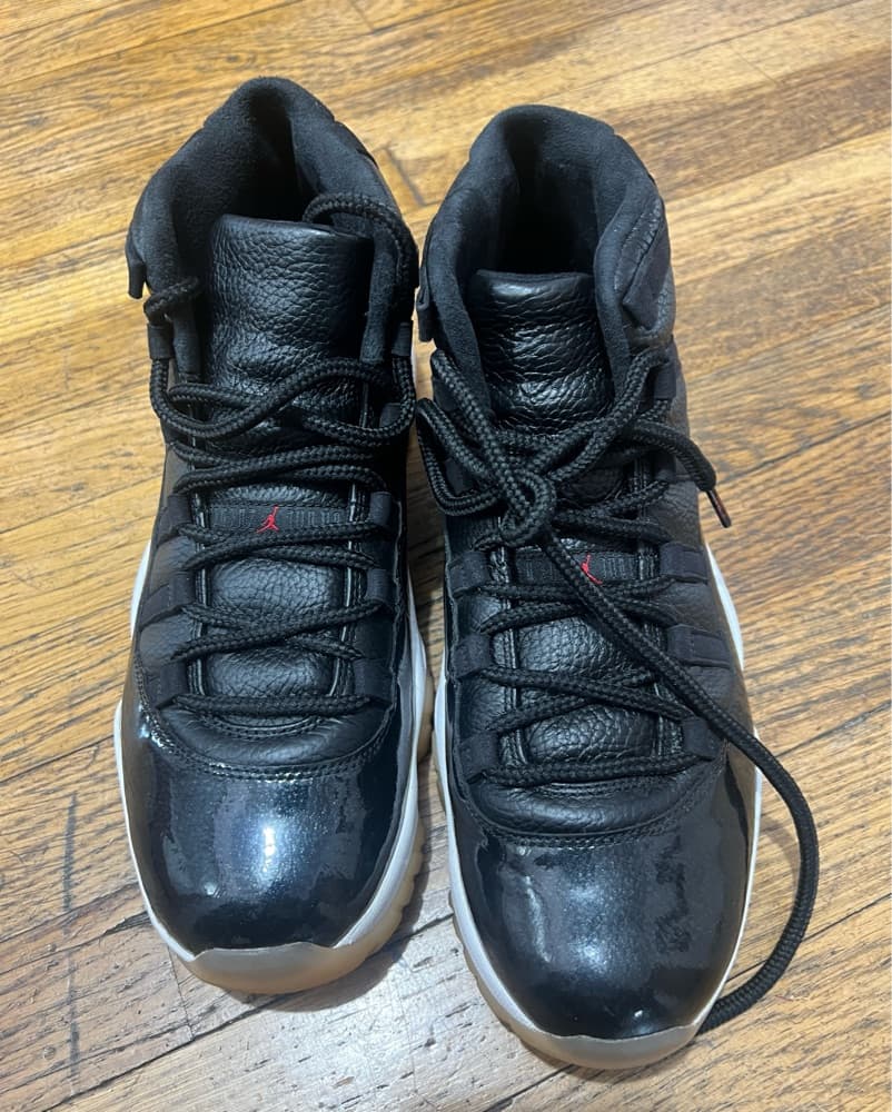 Sleek Black Jordan 11 Retro Sneakers - Image 2