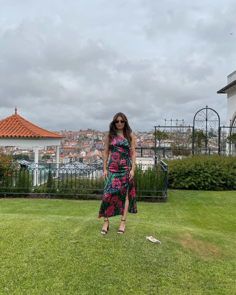 Bold Floral Midi Dress with Vibrant Accents - Image 1