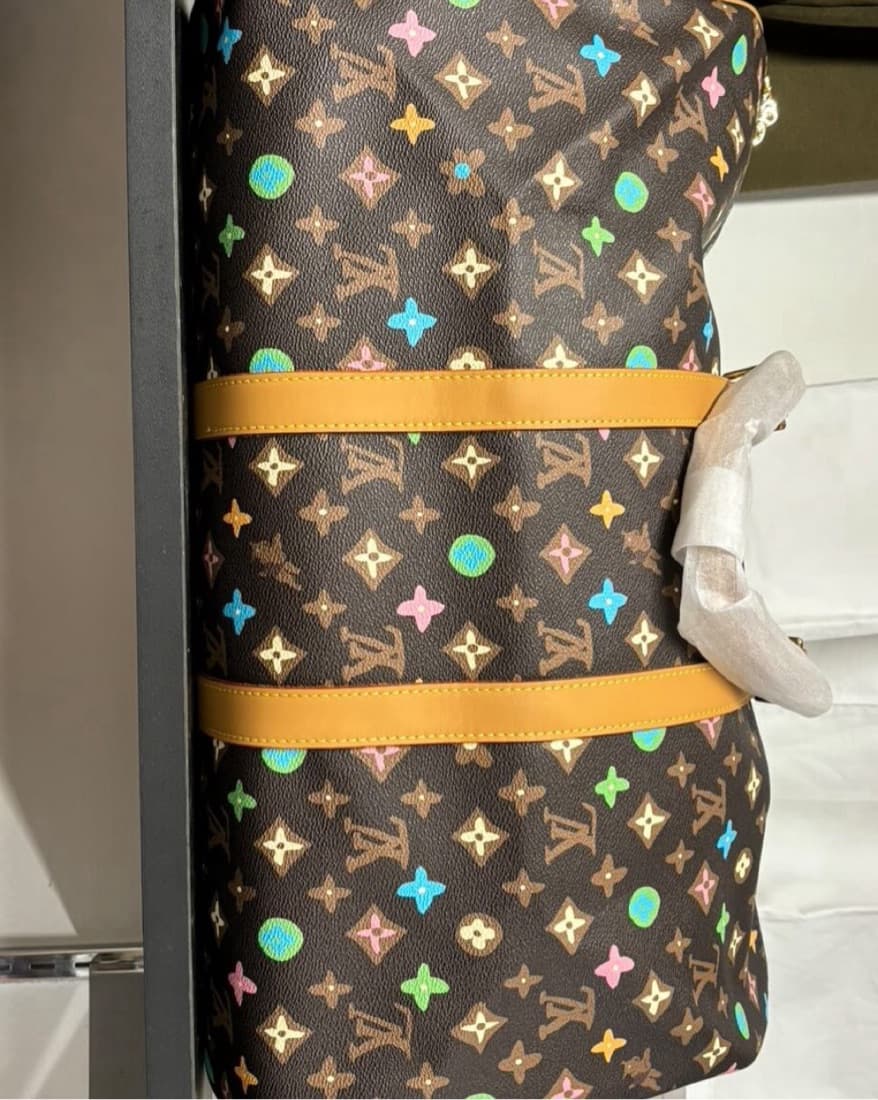 Louis Vuitton Duffle Bag - Image 1