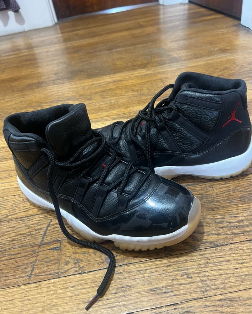 Sleek Black Jordan 11 Retro Sneakers - Image 4