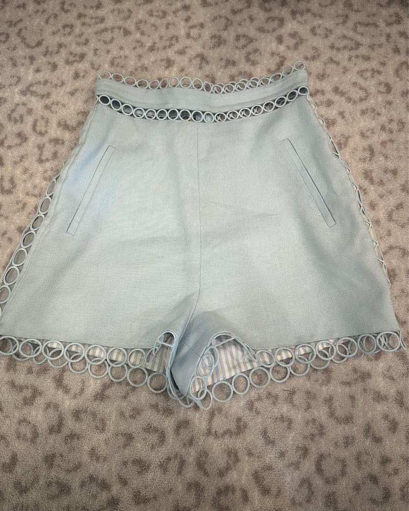 Trendy Eyelet Shorts with Eye-Catching Circle Detail - Image 2