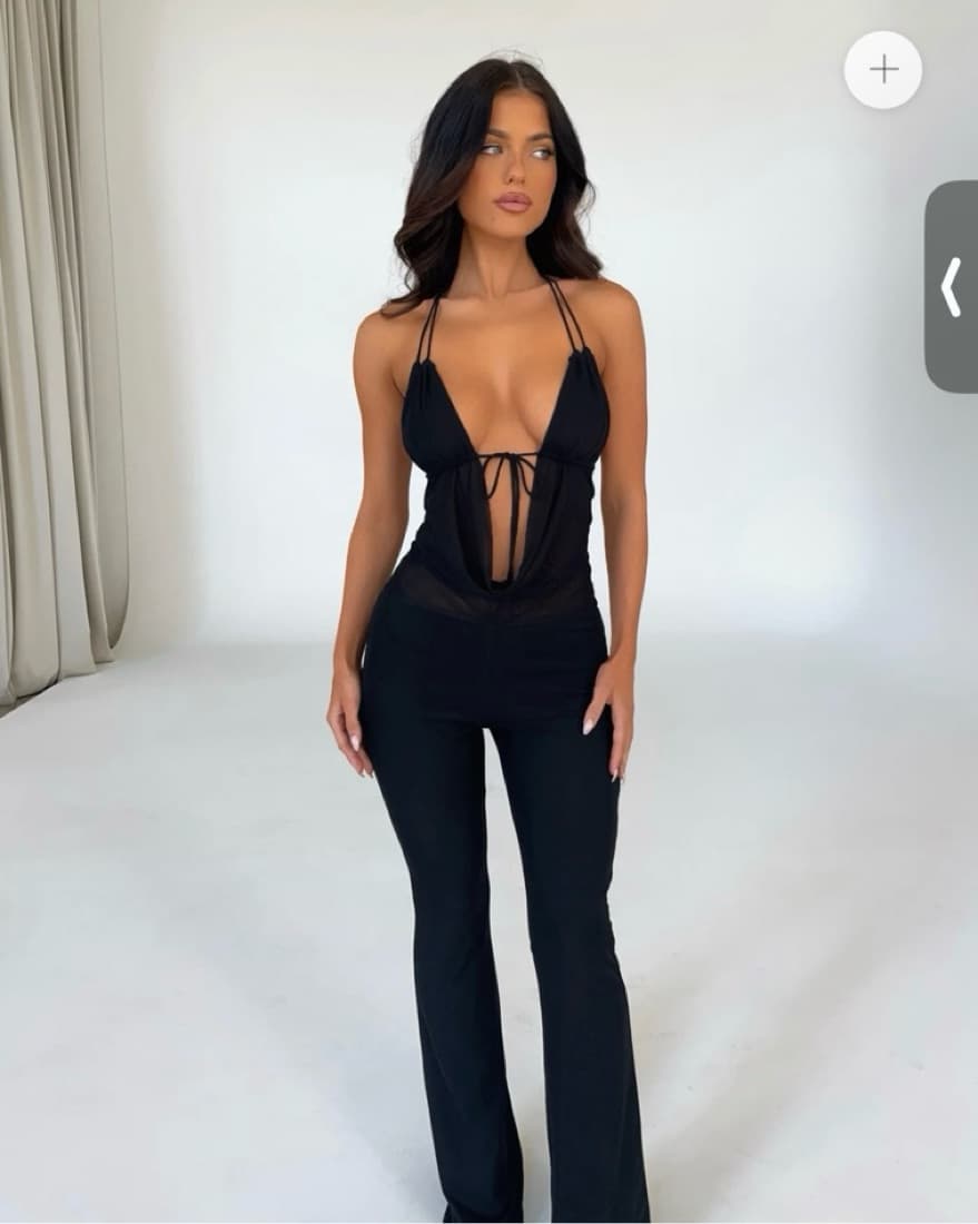 Black Jumpsuit with Plunging Neckline - Image 1